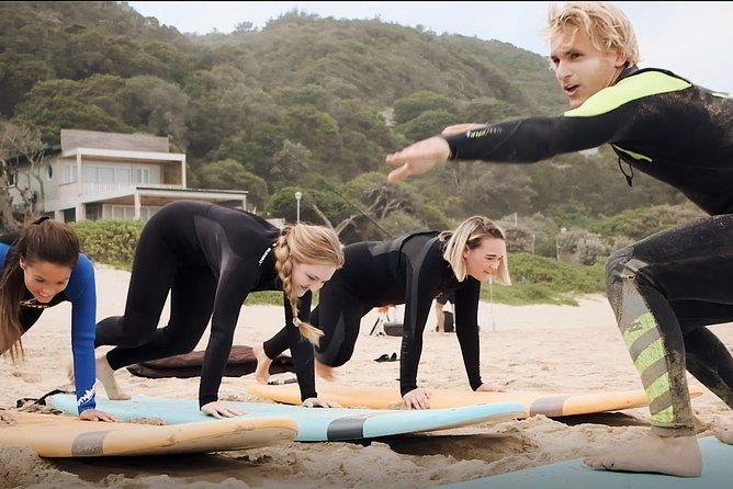 1h15min surfing lessons in Victoria Bay & Wilderness - Learning the pop-up before chasing waves
