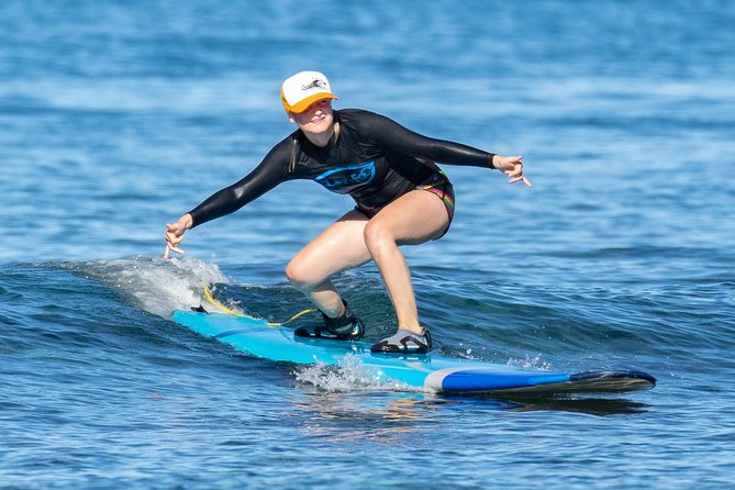2 Hour Beginner Group Surf Lessons - Paddling out and taking your first waves