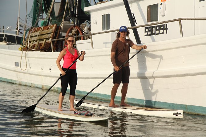 2-Hour Charleston Stand-Up Paddleboard Rentals - Rolling your board to the Folly River