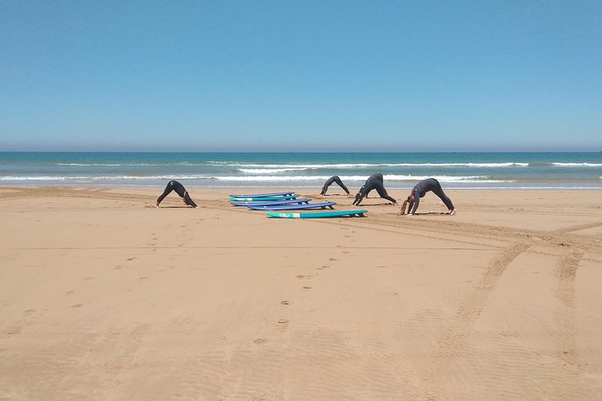 2h surfing in uncrowded spots - The beach warm-up and first board lesson