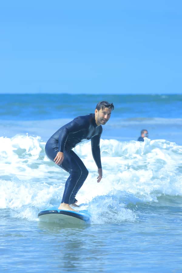 Agadir: Beginner Surf Lesson – Equipment Included - Practising the pop-up before the water