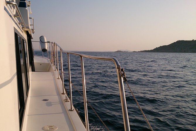 Alcudia 3hr Sunset Trip with Drinks, Tapas, SUP & Snorkel - Sunset, drinks, and a simple spread of tapas