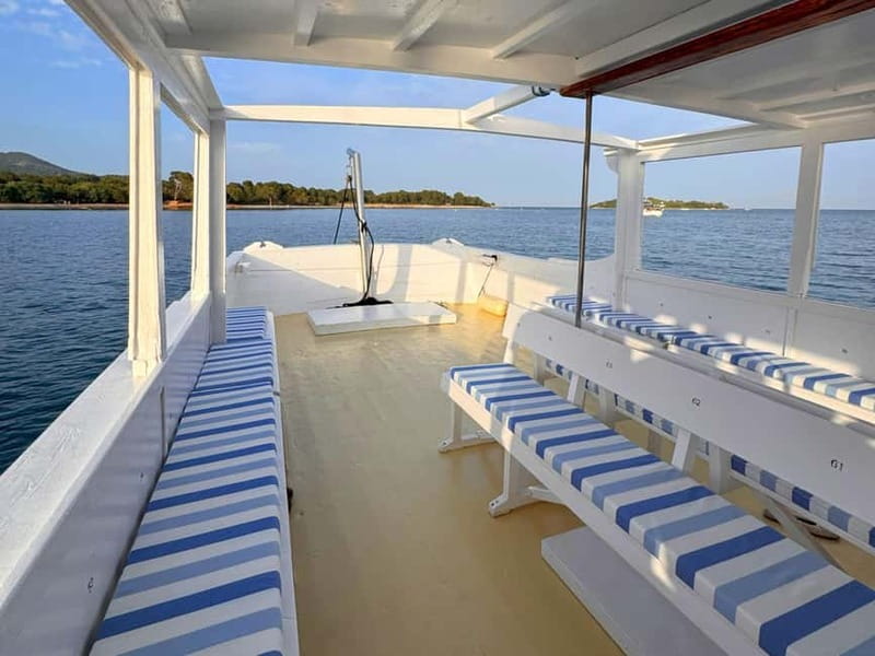 Alcudia Mallorca: Boat Trip with Food, Snorkeling, and SUP - Group size, music, and the overall mood