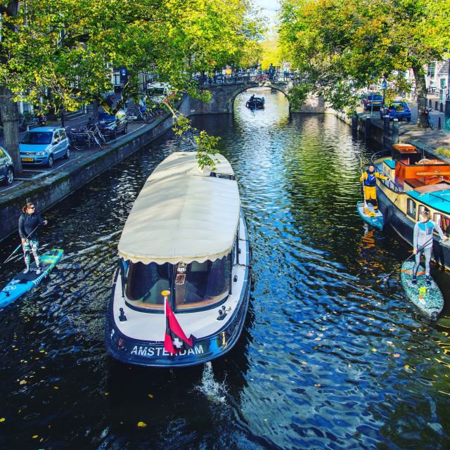 Amsterdam: 2-Hour Stand Up Paddle Board Tour - Learning to balance before entering the city