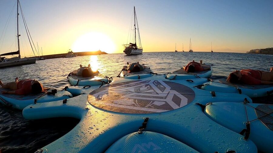 Arguineguín: Stand-up Paddleboard Yoga Class with Instructor - Trading your mat for a floating board