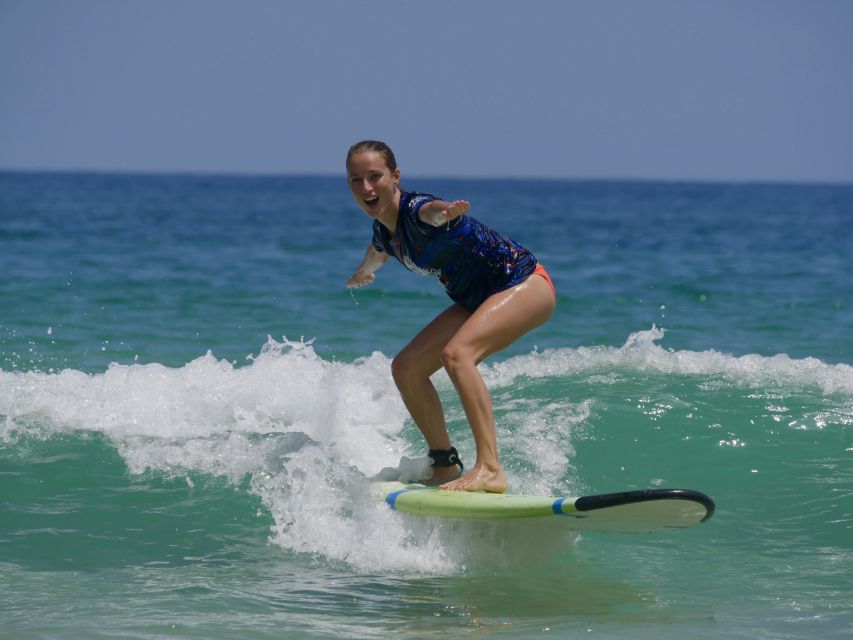 Bang Tao Beach: Group Or Private Surf Lessons - Into the Water: Catching Your First Wave