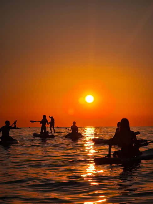 Barcelona: Paddleboarding at Sunrise. Includes: instructor, photos, equipment - Warming up after the water
