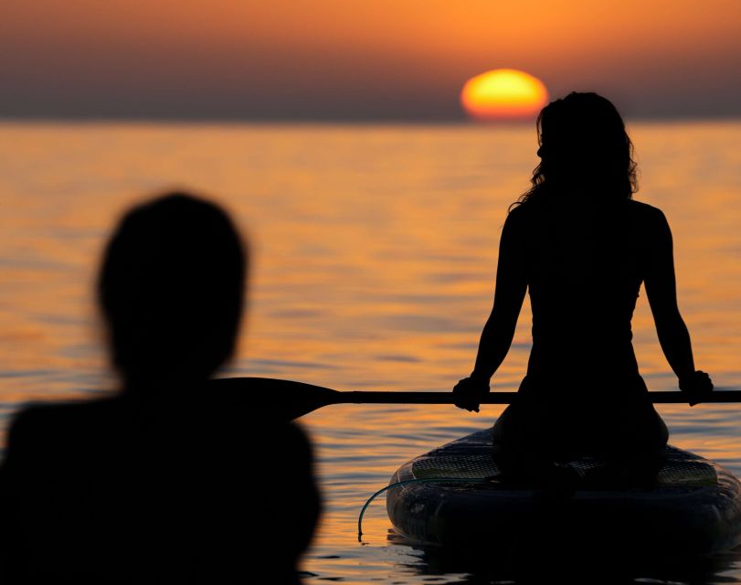 Barcelona: Sunrise Paddleboarding with Instructor and Photos - Your first lesson on Barceloneta Beach