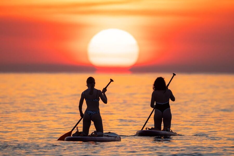 Barcelona: Sunrise Paddleboarding with Instructor and Photos - Clouds, choppy water, and the real weather question
