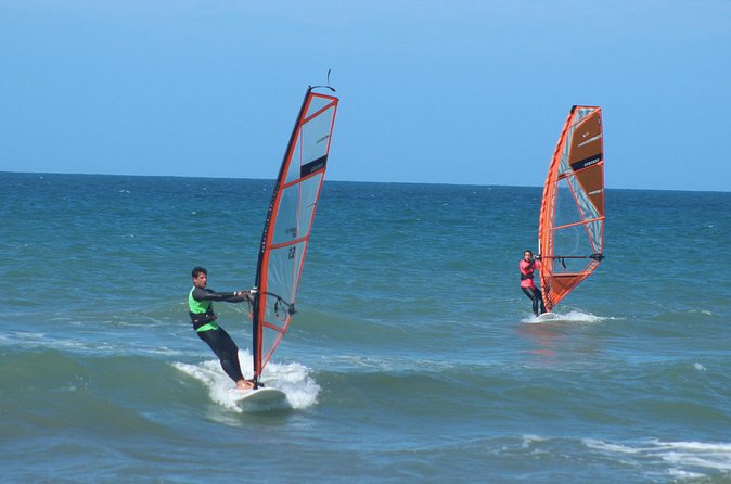 Beginner individual windsurfing lesson - Learning with board, sail, and safety gear
