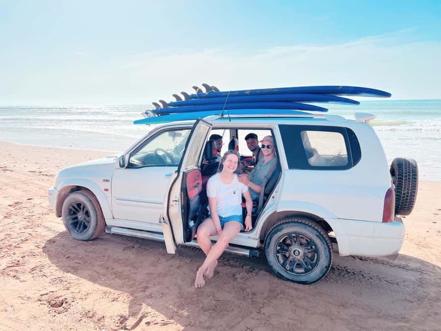 Beginners friendly surf in nice spots - Wetsuits, Warm-Up, and the First Board Lesson