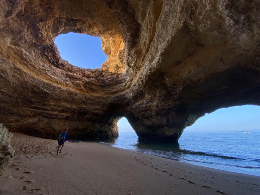 Benagil: Benagil Cave Stand Up PaddleBoard Tour at Sunrise - Booking, cancellation, and language choices