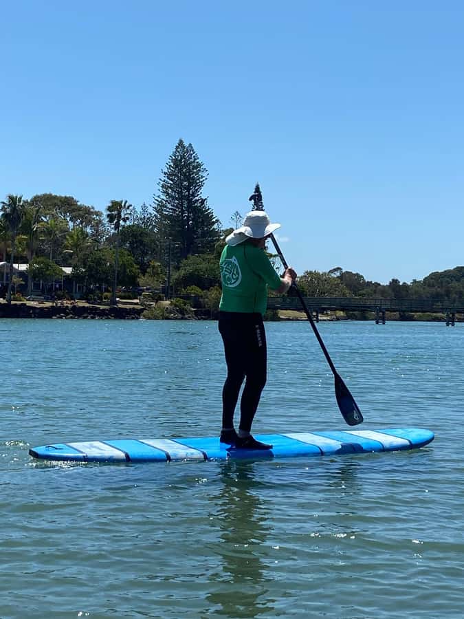 Byron Bay: Stand-Up Paddleboarding Lesson + Transfer - Equipment, clothing, and camera choices
