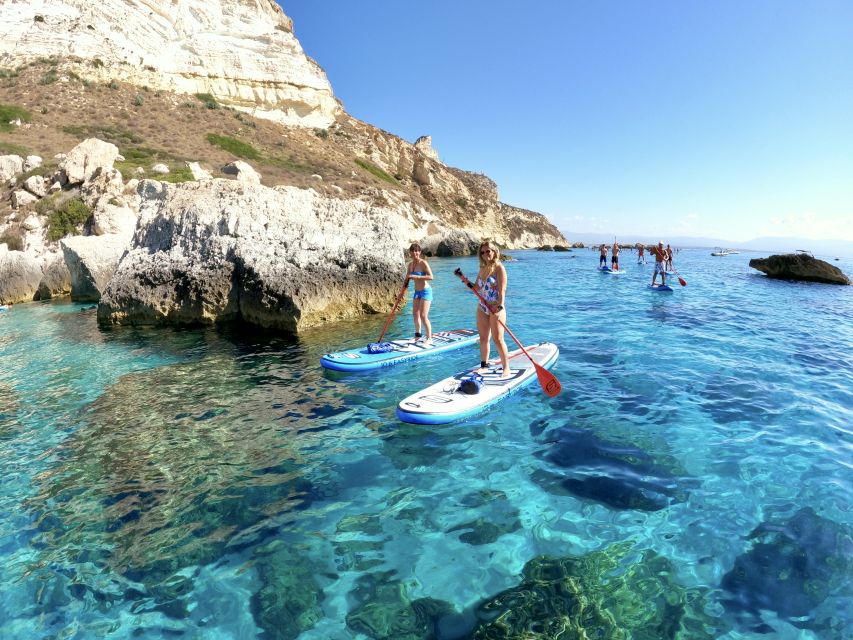 Cagliari: Stand Up Paddleboarding (SUP) Tour & Snorkeling - Paddling beneath the Sella del Diavolo