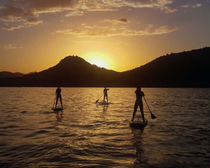 Cala Rajada: Stand Up Paddle Sunset Tour - Paddling along Cala Agulla bay