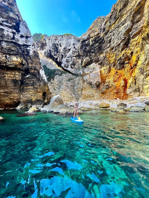 Cala Tango: Marine Reserve Cave & Snorkel Paddle Board Tour - Paddling past Platja del Pope