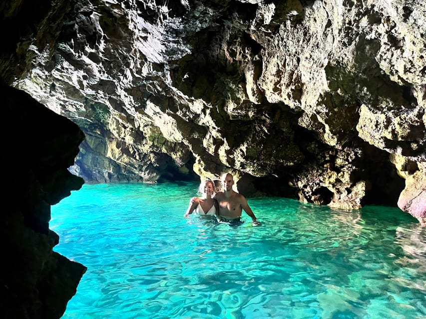 Cala Tango: Marine Reserve Cave & Snorkel Paddle Board Tour - Entering the Turquoise Cave