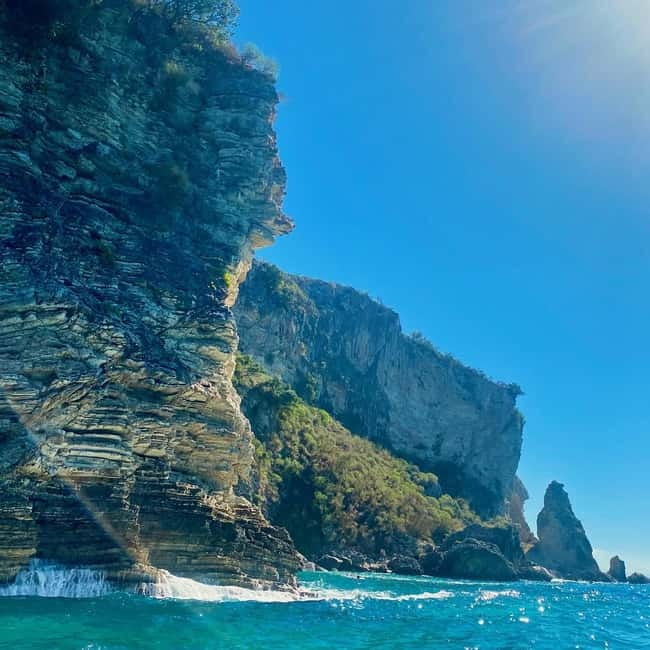 Caves of Porto Palermo: Kayak/SUP Tour with Castle Sea View - Across the bay to the second swimming stop