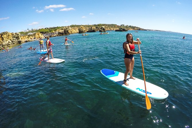 Cliffs & Caves Stand Up Paddle Adventure - Entering the caves by paddleboard
