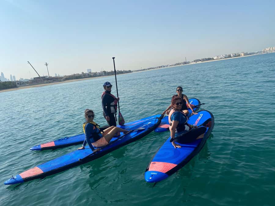 Dubai: Palm Jumeirah Paddle Boarding Tour - The return paddle and the chance to swim