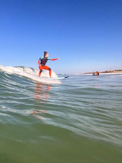 El Palmar: Group Surf class. - Equipment, club facilities, and the beach transfer