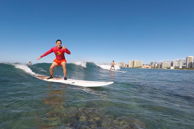 Exclusive Group Surfing Lesson with Waikiki Courtesy Shuttle - The sand lesson: board basics before the water