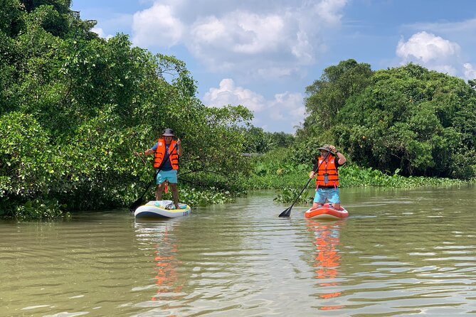 Explore Cu Chi Tunnels on Stand Up Paddle with lunch. - Morning pickup and the ride toward the river