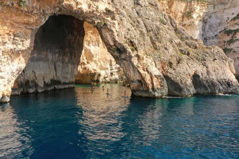 Explore Malta’s Blue Grotto by SUP - Paddling through Blue Grotto Bay