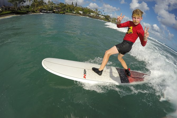 Family, Private & Group Surfing Lessons, Waikiki Courtesy Shuttle - Getting to Ohana Surf Project by yellow bus or white van