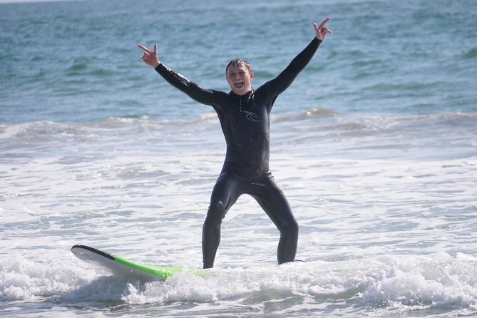 Family Surf Lesson - Getting into the water and catching small waves