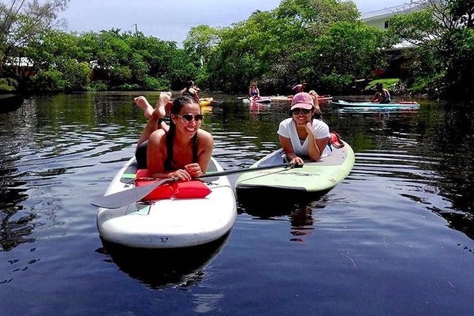 Fort Lauderdale Paddle Board Rentals. - Cruising past yachts and waterfront homes