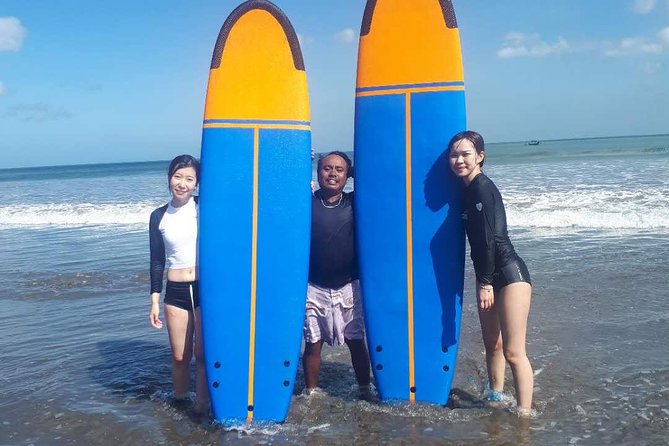 Fun Surf With Experienced Coach And Private Hotel Transfer - A family-friendly lesson with a physical side