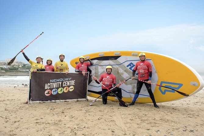 Giant Stand Up Paddle Boarding Experience in Newquay - Launching into Newquay Bay