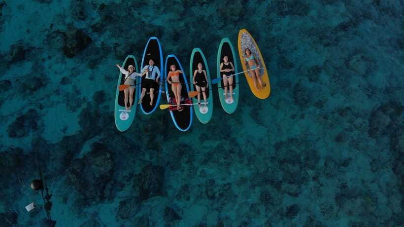 gili sunrise Stand-up paddle boarding or kayaking (droneshot - How This Compares With a Standard Snorkeling Trip