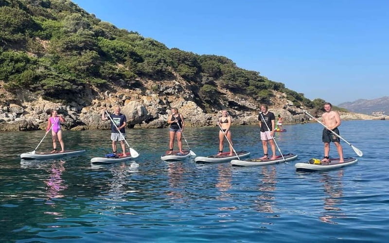 Golfo Aranci tour SUP Paddleboard Dolphin watching, aperitif - Swimming and snorkeling in clear water