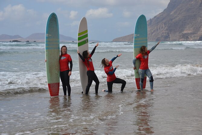 Group Longboard Surf Lesson in Lanzarote - Starting on the beach, where mistakes cost less