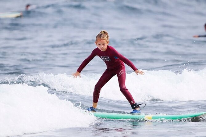 Group Surf Class in Playa de Las Américas with Photographs - The water session is built around your first ride