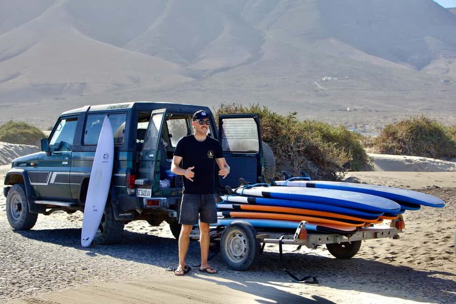 Group surf lessons in Lanzarote, learn with a local team - Warm-up and safety before the water