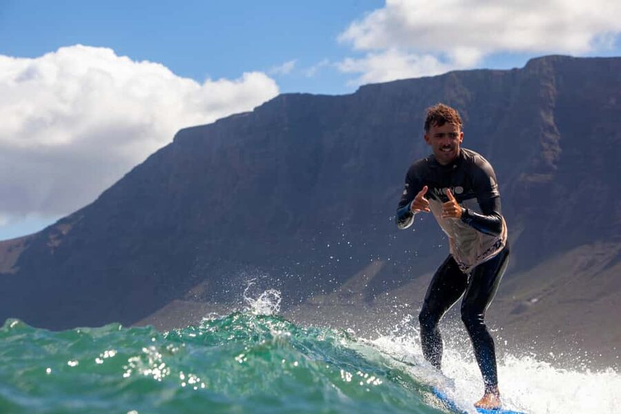 Group surf lessons in Lanzarote, learn with a local team - Sand practice: the take-off starts here
