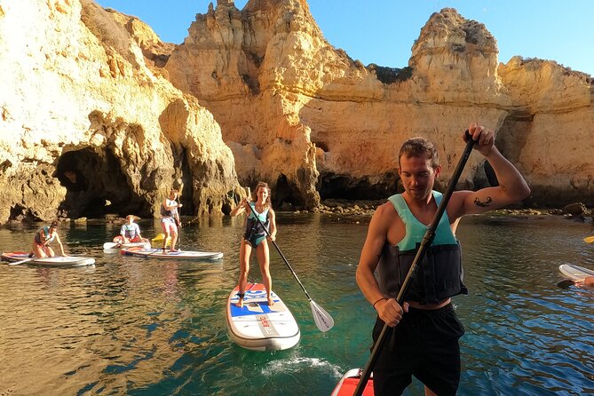 Guided SUP Caves Tour in Lagos – Ponta da Piedade | Small Group - Taking photos without risking your phone