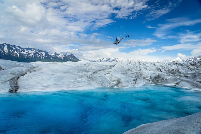 Helicopter and Glacier Paddle Boarding -PRIVATE - Landing on ice with Tom, Maty, and the guide team