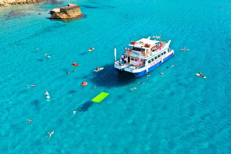 Ibiza: Beach Hopping Cruise w/ Paddleboard, Food, & Drinks - Cala Tarida and Cala Comte: two different kinds of beach time