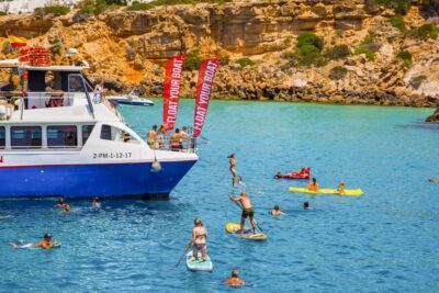Beach Hopping Cruise w/ Paddleboard, Food, & Drinks