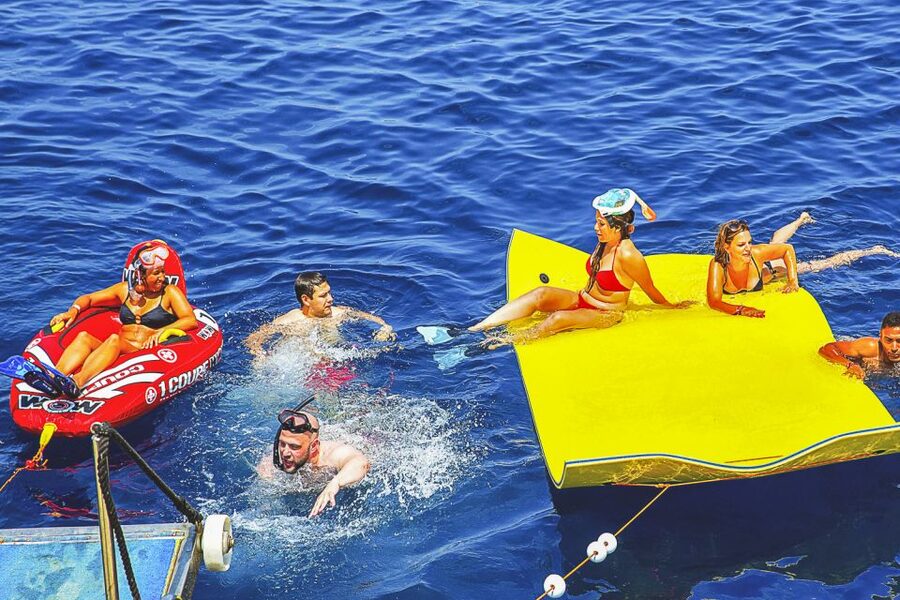 Ibiza: Beach Hopping Cruise w/ Paddleboard, Food, & Drinks - The secluded bay is where the action starts
