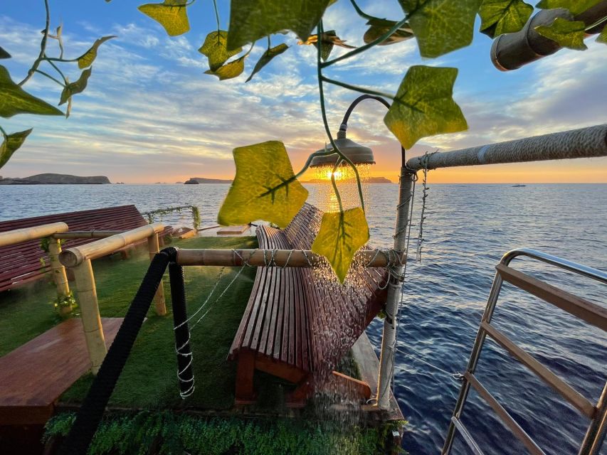 Ibiza: Sea Caves & Coves Snorkeling Paddle Boarding Tour - Drinks, fruit, and the social mood
