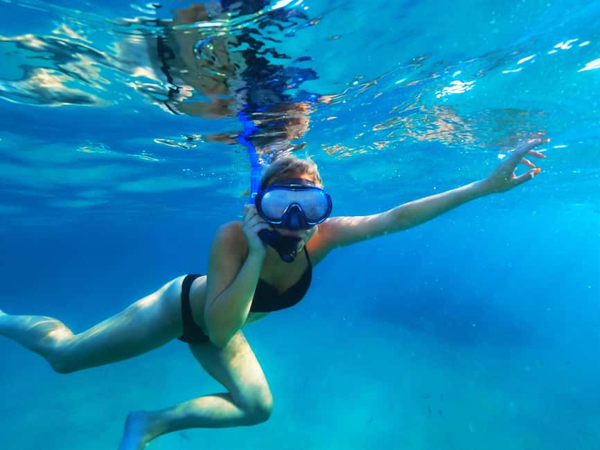 Ibiza: Snorkeling and SUP Paddle, Beach and Cave Tour - A three-hour boat trip with plenty to do