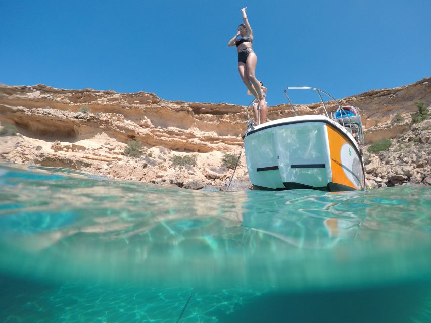 Ibiza: SUP & Snorkel Boat Tour with Caves, Drinks & Photos - Photos from the boat, board, and water