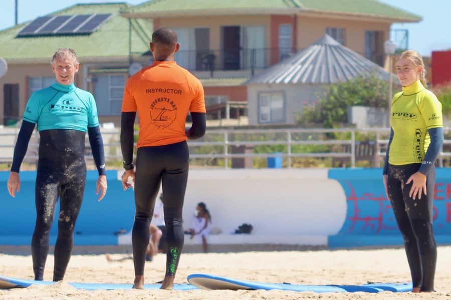 Jeffreys Bay: Learn to Surf Group Lesson - Waist-deep water and the first attempts