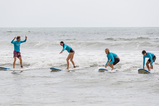 Learn to Surf at Coolangatta on the Gold Coast - Returning to shore to learn the pop-up