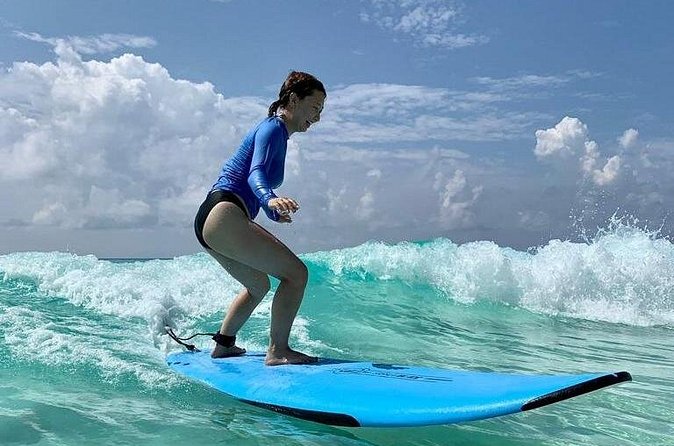 Learn to Surf in 1 Easy Lesson in Cancún - English instruction and the Spanish-language question
